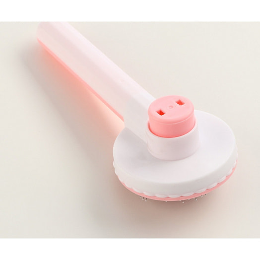 Пуходёрка пластиковая с функцией самоочистки 7,7х19,1см, розовая арт.9001563 Китай